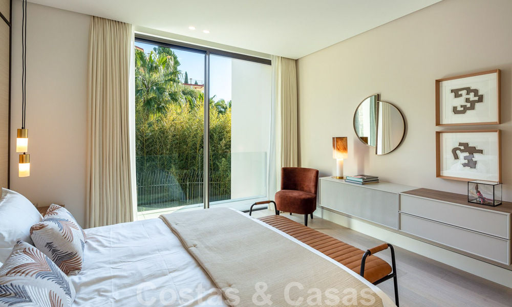Move-in ready, architectural designer villa for sale with open sea views in a prestigious gated residential area in the hills of La Quinta in Benahavis - Marbella 49270