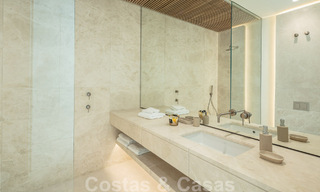 Move-in ready, architectural designer villa for sale with open sea views in a prestigious gated residential area in the hills of La Quinta in Benahavis - Marbella 49271 