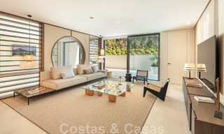 Move-in ready, architectural designer villa for sale with open sea views in a prestigious gated residential area in the hills of La Quinta in Benahavis - Marbella 49274 