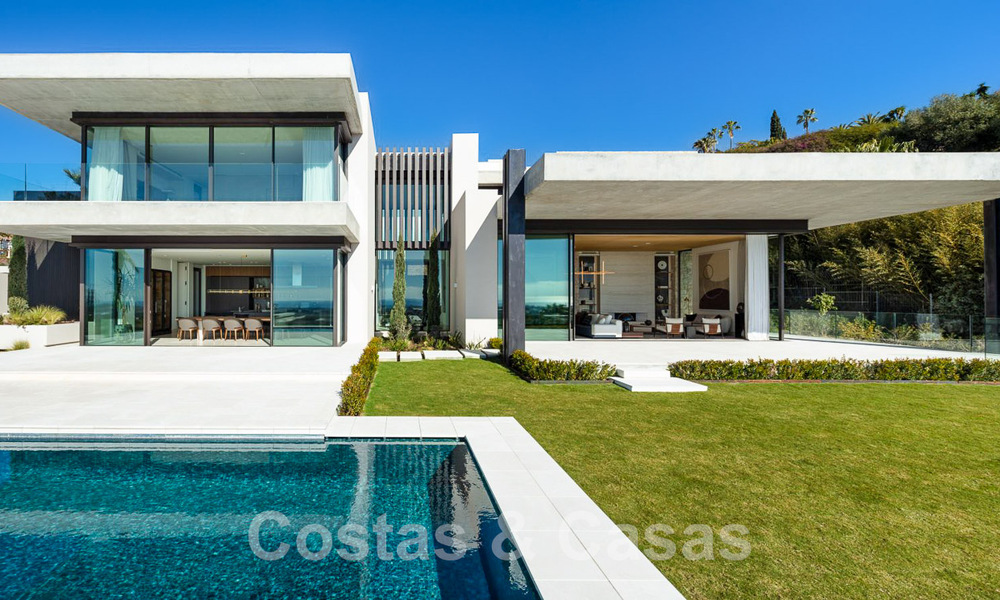 Move-in ready, architectural designer villa for sale with open sea views in a prestigious gated residential area in the hills of La Quinta in Benahavis - Marbella 49277