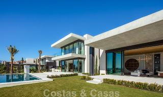 Move-in ready, architectural designer villa for sale with open sea views in a prestigious gated residential area in the hills of La Quinta in Benahavis - Marbella 49278 