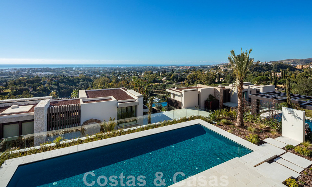Move-in ready, architectural designer villa for sale with open sea views in a prestigious gated residential area in the hills of La Quinta in Benahavis - Marbella 49279