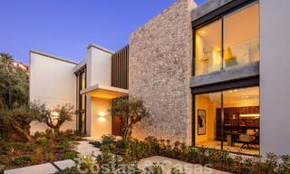 Move-in ready, architectural designer villa for sale with open sea views in a prestigious gated residential area in the hills of La Quinta in Benahavis - Marbella 49281 