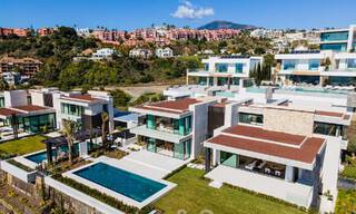 Move-in ready, architectural designer villa for sale with open sea views in a prestigious gated residential area in the hills of La Quinta in Benahavis - Marbella 49283 
