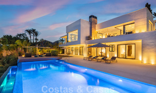 Modern luxury villa for sale located with private tennis court in prestigious residential area in Nueva Andalucia's golf valley, Marbella 50128 