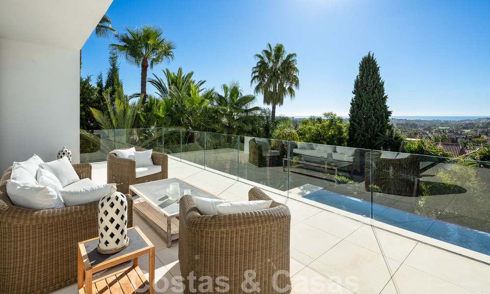 Modern luxury villa for sale located with private tennis court in prestigious residential area in Nueva Andalucia's golf valley, Marbella 50129