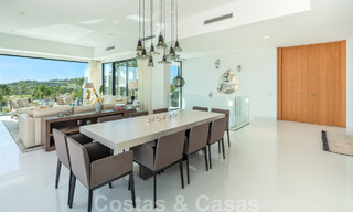 Modern luxury villa for sale located with private tennis court in prestigious residential area in Nueva Andalucia's golf valley, Marbella 50133 