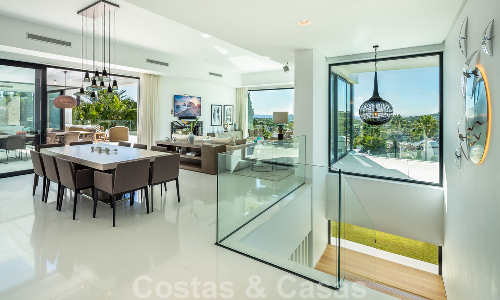 Modern luxury villa for sale located with private tennis court in prestigious residential area in Nueva Andalucia's golf valley, Marbella 50134