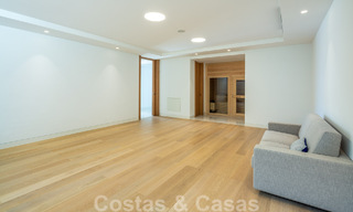 Modern luxury villa for sale located with private tennis court in prestigious residential area in Nueva Andalucia's golf valley, Marbella 50140 
