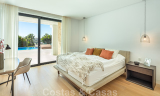 Modern luxury villa for sale located with private tennis court in prestigious residential area in Nueva Andalucia's golf valley, Marbella 50141 