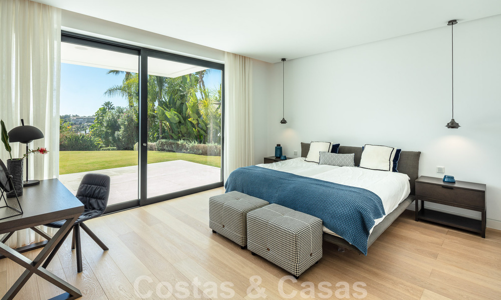 Modern luxury villa for sale located with private tennis court in prestigious residential area in Nueva Andalucia's golf valley, Marbella 50144