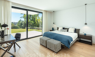 Modern luxury villa for sale located with private tennis court in prestigious residential area in Nueva Andalucia's golf valley, Marbella 50144 