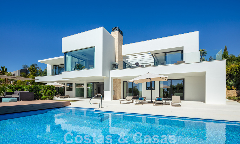 Modern luxury villa for sale located with private tennis court in prestigious residential area in Nueva Andalucia's golf valley, Marbella 50149