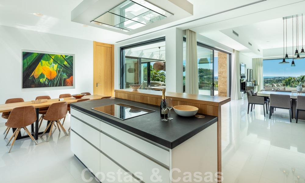 Modern luxury villa for sale located with private tennis court in prestigious residential area in Nueva Andalucia's golf valley, Marbella 50154