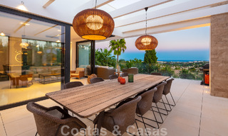 Modern luxury villa for sale located with private tennis court in prestigious residential area in Nueva Andalucia's golf valley, Marbella 50158 