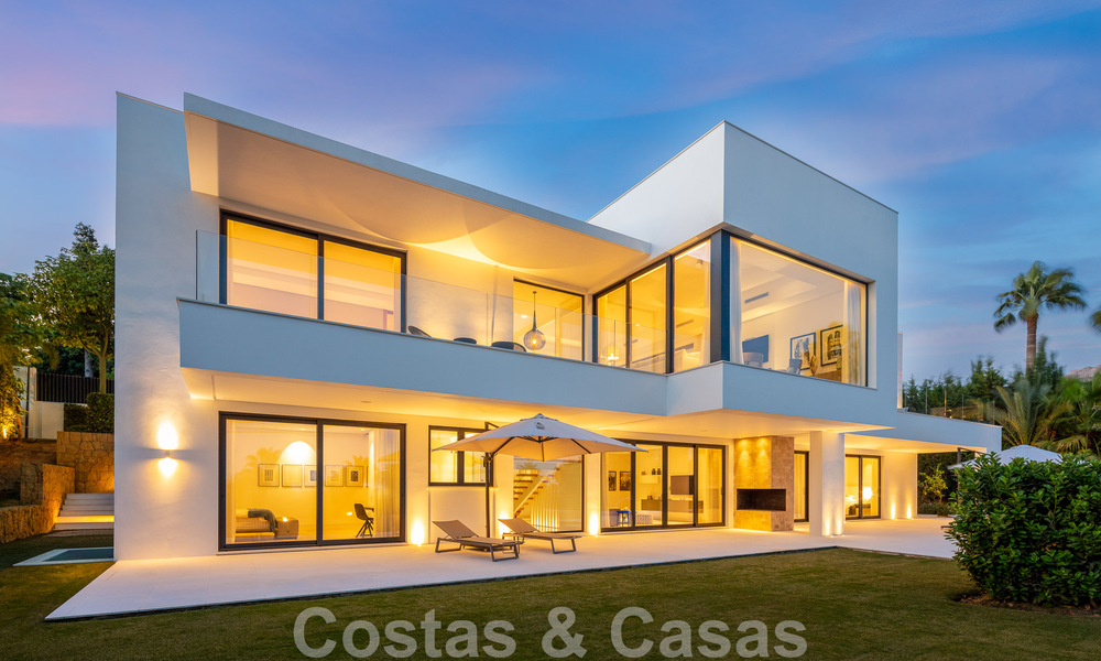 Modern luxury villa for sale located with private tennis court in prestigious residential area in Nueva Andalucia's golf valley, Marbella 50162