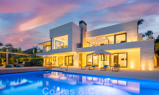 Modern luxury villa for sale located with private tennis court in prestigious residential area in Nueva Andalucia's golf valley, Marbella 50163 