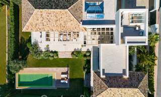 Detached, Mediterranean luxury villa for sale with heated pool and sea views surrounded by golf courses in Nueva Andalucia, Marbella 50712 