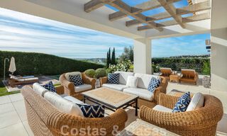 Detached, Mediterranean luxury villa for sale with heated pool and sea views surrounded by golf courses in Nueva Andalucia, Marbella 50719 