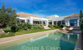 Detached, Mediterranean luxury villa for sale with heated pool and sea views surrounded by golf courses in Nueva Andalucia, Marbella 50731 