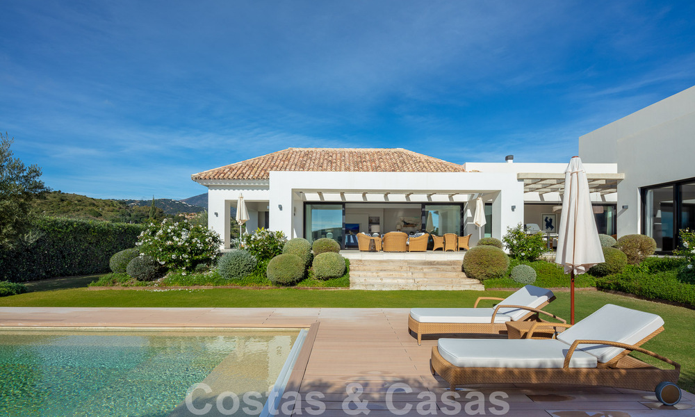 Detached, Mediterranean luxury villa for sale with heated pool and sea views surrounded by golf courses in Nueva Andalucia, Marbella 50732