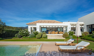 Detached, Mediterranean luxury villa for sale with heated pool and sea views surrounded by golf courses in Nueva Andalucia, Marbella 50732 