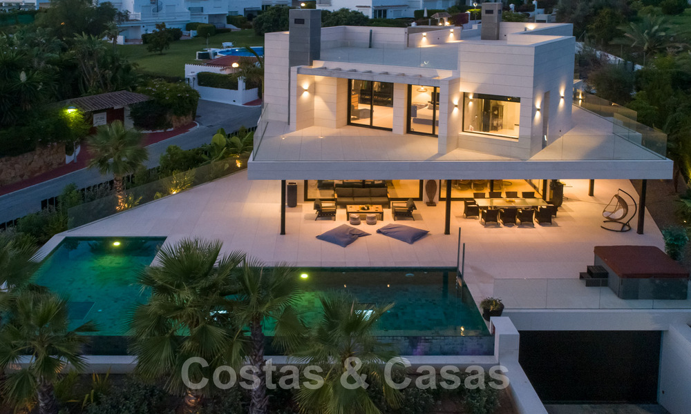 Sophisticated modern-style designer villa for sale in a gated community in Nueva Andalucia's golf valley, Marbella 50608