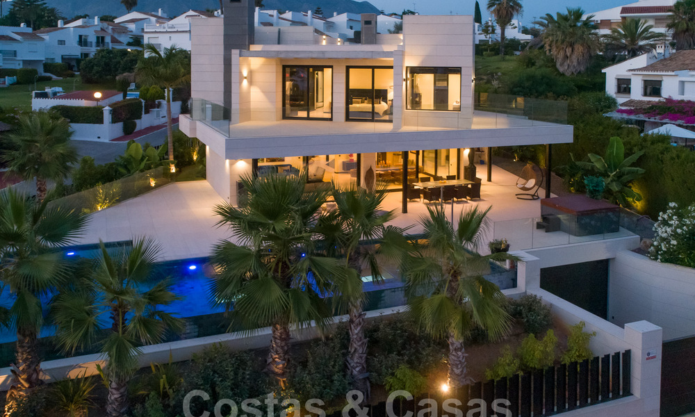 Sophisticated modern-style designer villa for sale in a gated community in Nueva Andalucia's golf valley, Marbella 50609