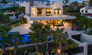 Sophisticated modern-style designer villa for sale in a gated community in Nueva Andalucia's golf valley, Marbella 50609 