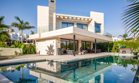 Sophisticated modern-style designer villa for sale in a gated community in Nueva Andalucia's golf valley, Marbella 50617