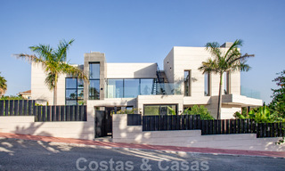 Sophisticated modern-style designer villa for sale in a gated community in Nueva Andalucia's golf valley, Marbella 50618 