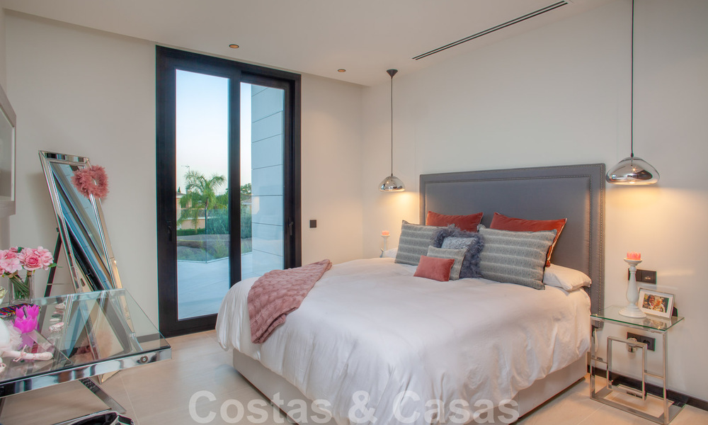 Sophisticated modern-style designer villa for sale in a gated community in Nueva Andalucia's golf valley, Marbella 50625