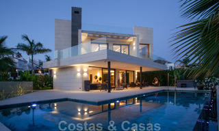 Sophisticated modern-style designer villa for sale in a gated community in Nueva Andalucia's golf valley, Marbella 50631 