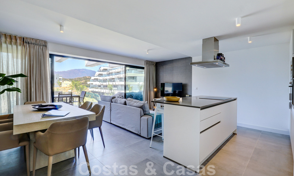 Move-in ready, modern 3-bedroom apartment for sale in a golf resort on the New Golden Mile, between Marbella and Estepona 50804