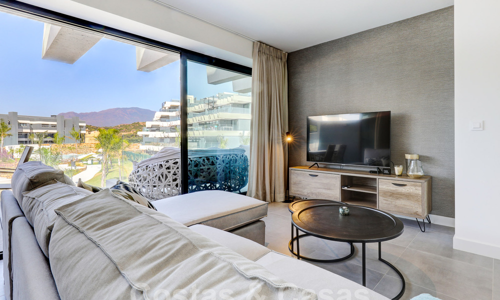 Move-in ready, modern 3-bedroom apartment for sale in a golf resort on the New Golden Mile, between Marbella and Estepona 50809