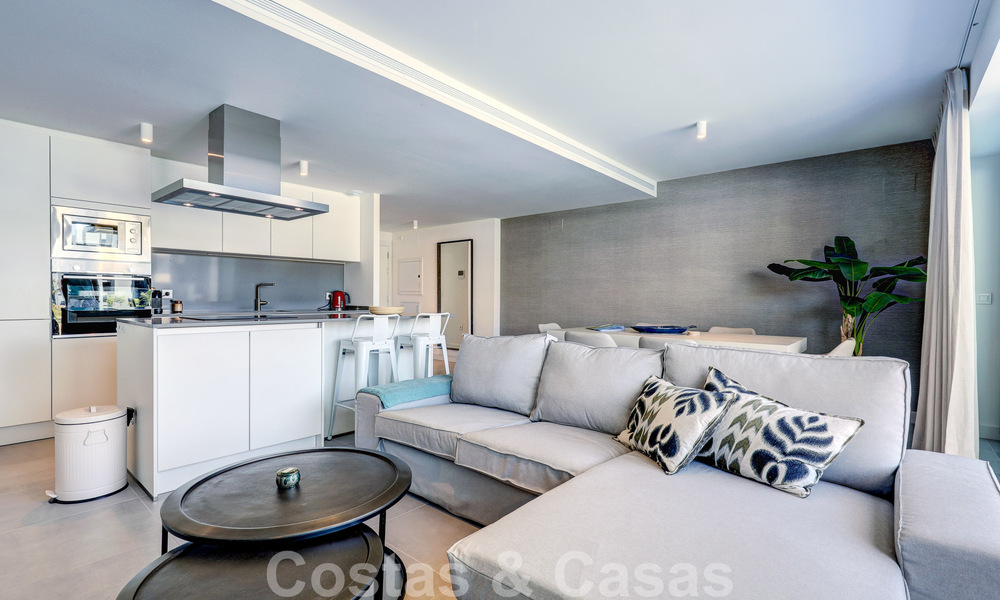 Move-in ready, modern 3-bedroom apartment for sale in a golf resort on the New Golden Mile, between Marbella and Estepona 50811