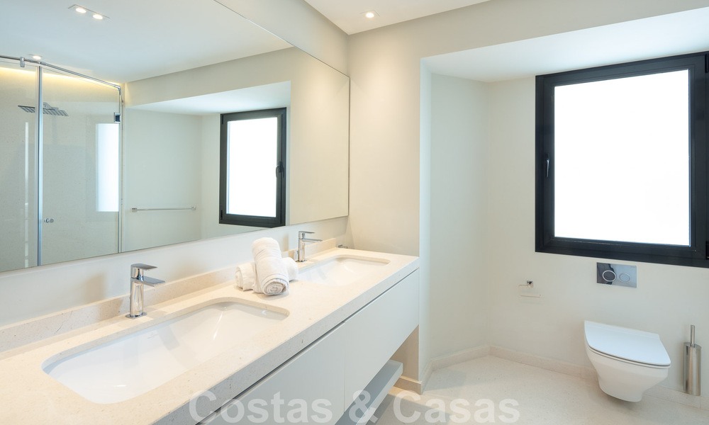 Spanish luxury villa for sale with contemporary Mediterranean architecture located in the heart of Nueva Andalucia's golf valley in Marbella 51212