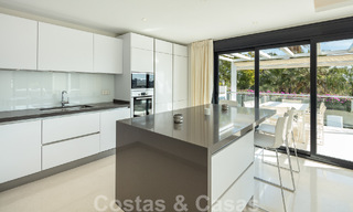 Spanish luxury villa for sale with contemporary Mediterranean architecture located in the heart of Nueva Andalucia's golf valley in Marbella 51225 