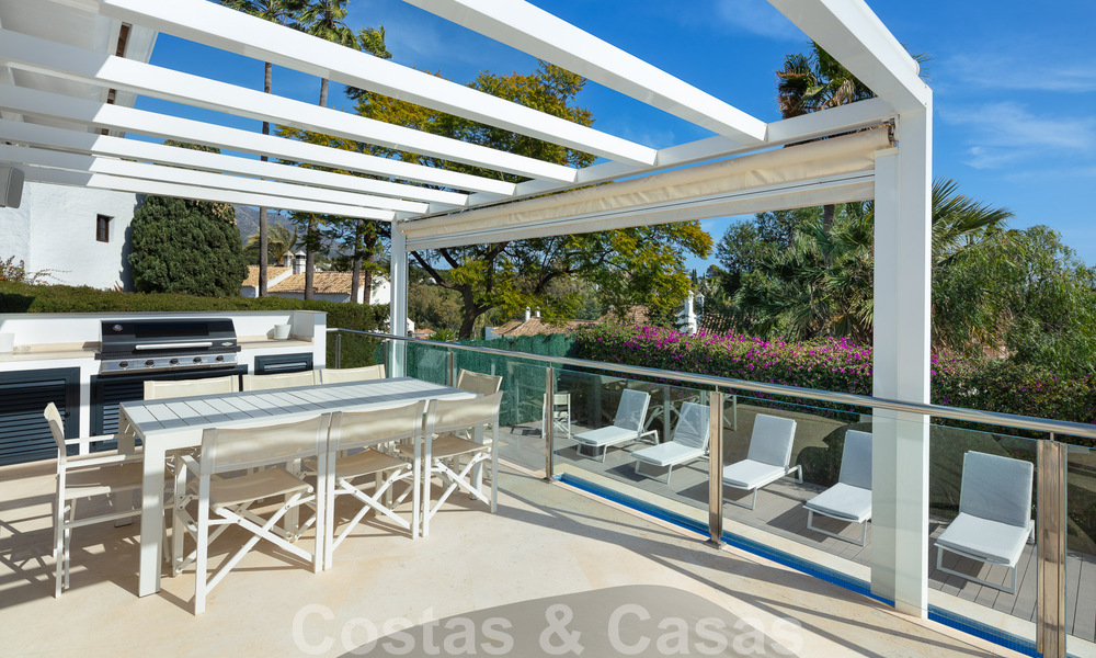 Spanish luxury villa for sale with contemporary Mediterranean architecture located in the heart of Nueva Andalucia's golf valley in Marbella 51228