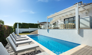 Spanish luxury villa for sale with contemporary Mediterranean architecture located in the heart of Nueva Andalucia's golf valley in Marbella 51230 