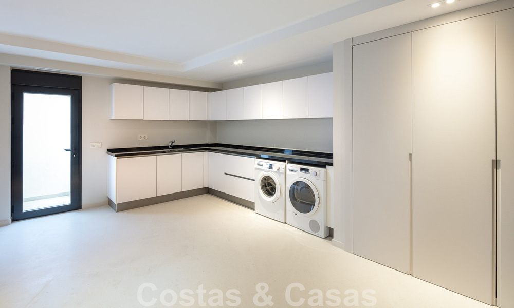 Spanish luxury villa for sale with contemporary Mediterranean architecture located in the heart of Nueva Andalucia's golf valley in Marbella 51234