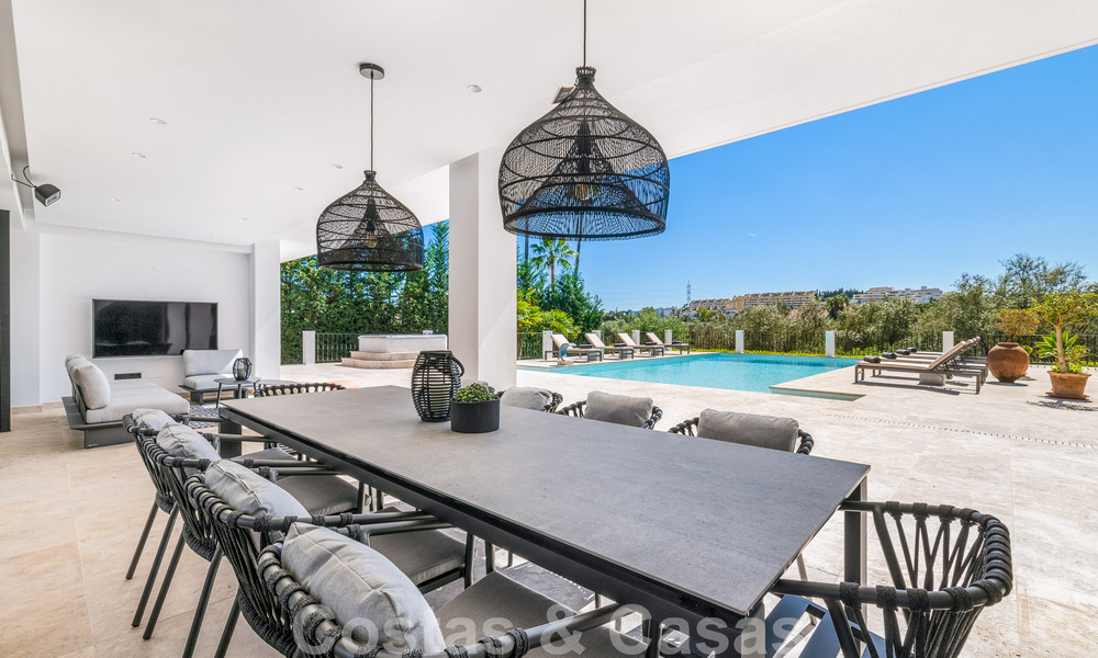 Move-in ready luxury villa for sale adjacent to Las Brisas golf course, in a gated community in Nueva Andalucia's golf valley, Marbella 51446