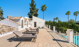 Move-in ready luxury villa for sale adjacent to Las Brisas golf course, in a gated community in Nueva Andalucia's golf valley, Marbella 51455 