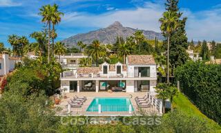 Move-in ready luxury villa for sale adjacent to Las Brisas golf course, in a gated community in Nueva Andalucia's golf valley, Marbella 52081 