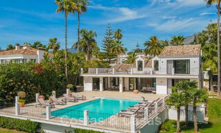 Move-in ready luxury villa for sale adjacent to Las Brisas golf course, in a gated community in Nueva Andalucia's golf valley, Marbella 52083 