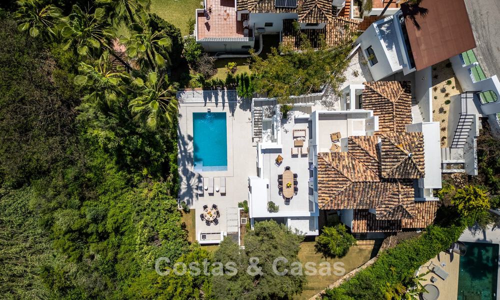 New luxury villa for sale with a contemporary architectural style located in a secure community of Nueva Andalucia, Marbella 782506
