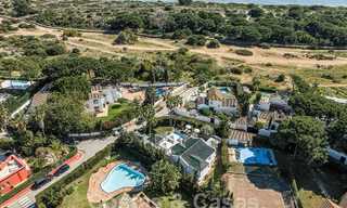 Luxury villa for sale in an Andalusian architectural style, east of Marbella centre, a stone's throw from the dunes and beach 52670 