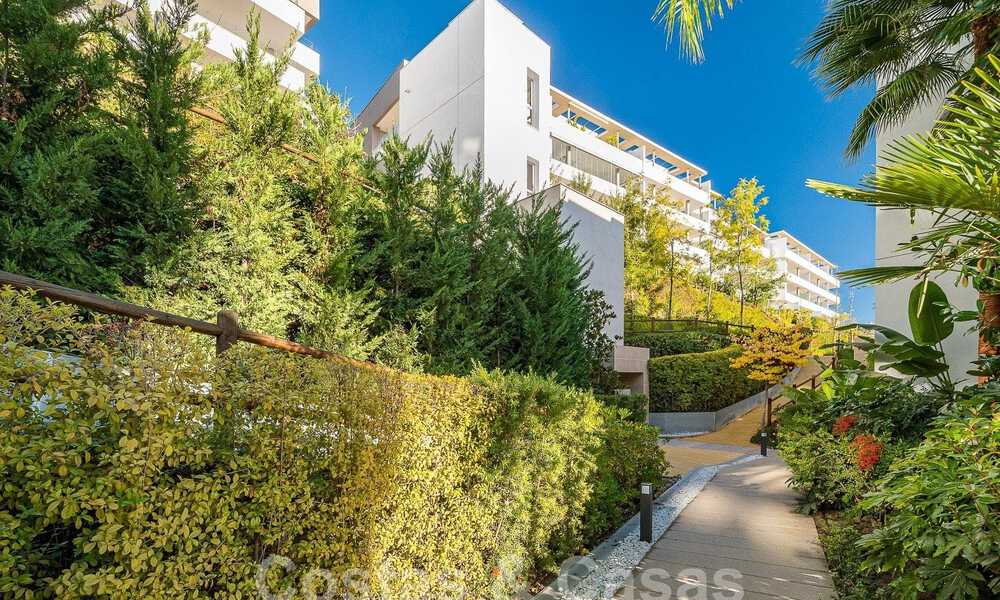 Move-in ready, elevated ground floor apartment for sale with sweeping views of the valley and sea in exclusive Benahavis - Marbella 53284