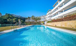 Move-in ready, elevated ground floor apartment for sale with sweeping views of the valley and sea in exclusive Benahavis - Marbella 53285 