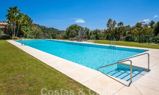 Move-in ready, elevated ground floor apartment for sale with sweeping views of the valley and sea in exclusive Benahavis - Marbella 53308 